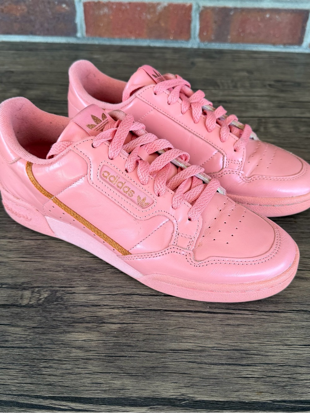 adidas Pink Leather Low-Top Sneakers with Gold Stripe